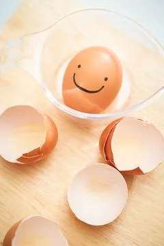 Cracked eggshell close-up Stock Photos