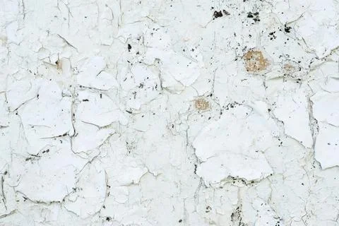 Cracked flaking white paint, background texture. Old grunge textures backgrounds Stock Photos