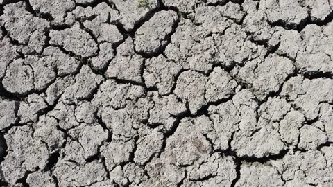 Cracked ground after drought soil drought concept. climate change and global 動画素材 334030133