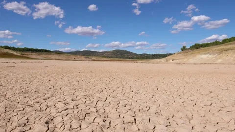 Cracked ground after drought soil soil crust earth climate change environmental Vídeo Stock 334030341