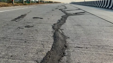 Cracked Highway Surface POV Tracking Shot Video stock 337095590
