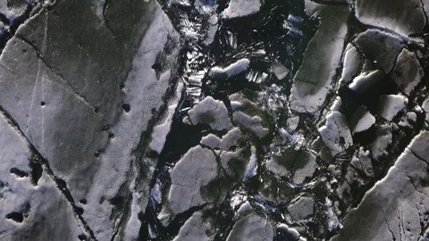 Cracked ice. Global warming. Climate changing. Stock-Footage 94134594