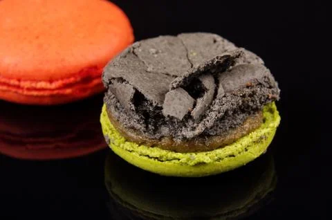 Cracked macaroon close up Stock Photos