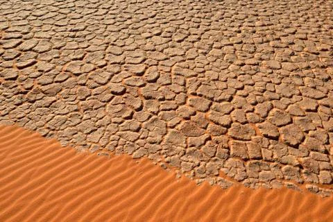Cracked mud patterns on the playa Tassili nAjjer National Park UNESCO World Stock Photos