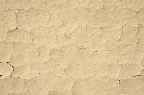 Cracked mud plaster wall closeup Foto stock