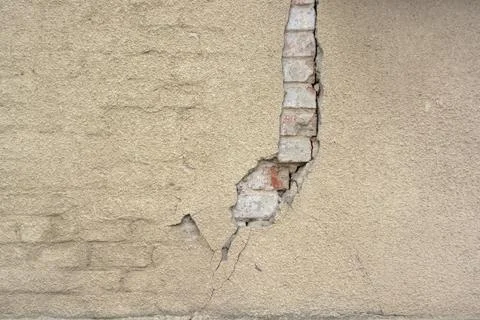 Cracked old cement plaster texture Stock Photos