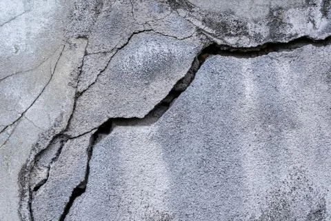 Cracked old cement wall background, cracked old concrete Stock Photos
