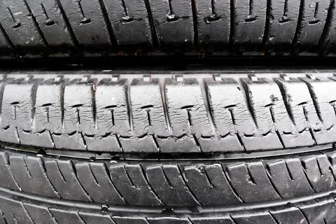 Cracked old tire texture, auto tyre garbage and pollution concept. Stock Photos