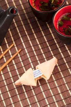 Cracked open fortune cookie Stock Photos