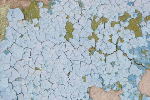 Cracked paint on the wall as a backdrop. Stock Photos