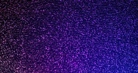 Cracked pane of glass lit from below red, white, blue emergency/police lights Stock Footage 339620025