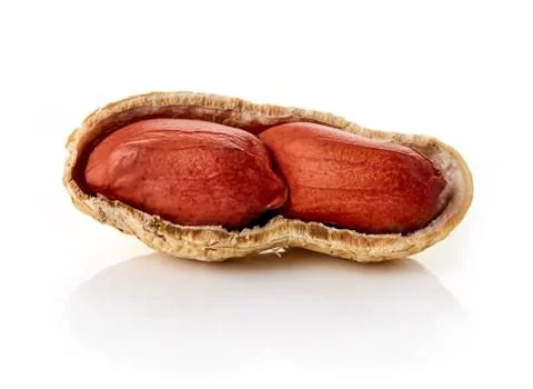 Cracked peanuts on white backround Stock Photos