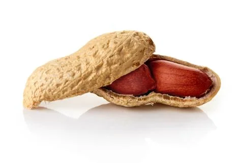 Cracked peanuts on white backround Stock Photos