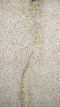 Cracked pebble wall texture Stock Photos