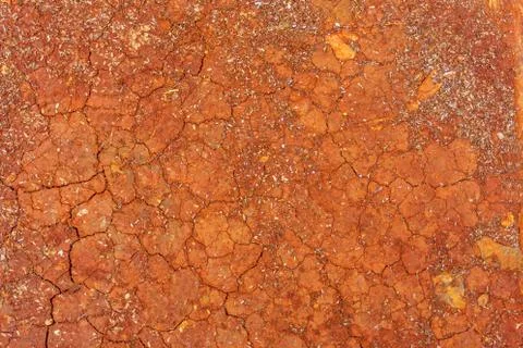 Cracked red soil surface Stock Photos