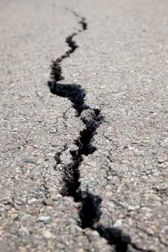 Cracked road Stock Photos