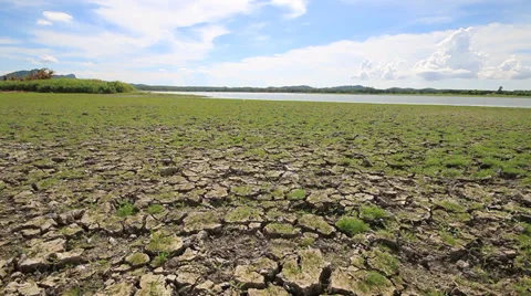 Cracked soil ground with blue sky Stock Footage 38983301