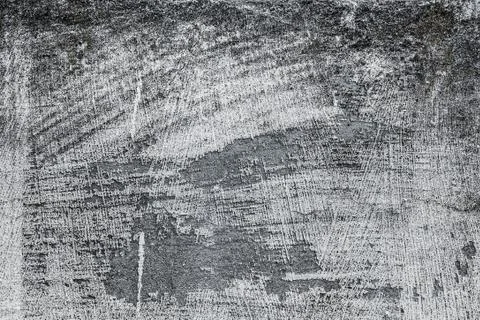 Cracked stone wall background. Grey grunge textured Stock Photos