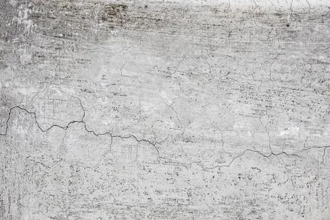 Cracked stone wall background Stock Photos