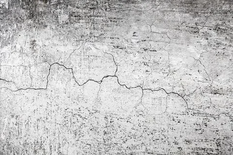 Cracked stone wall background Stock Photos