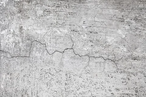 Cracked stone wall background Stock Photos