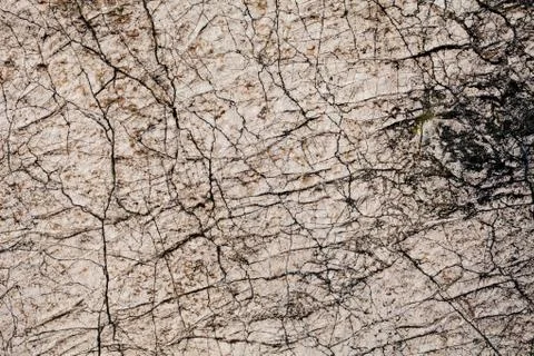 Cracked stone wall Stock Photos