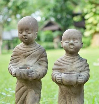 Cracked surface of old Buddha statue, decline of Buddhism concep Stock Photos