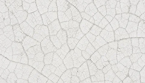 Cracked surface texture background pattern. Ilustración de archivo