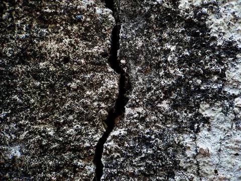 Cracked texture rough wall Cement white gray wall background, suitable for di Stock Photos