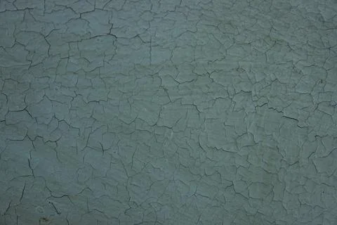 Cracked turquoise paint texture on a solid surface, Stock Photos