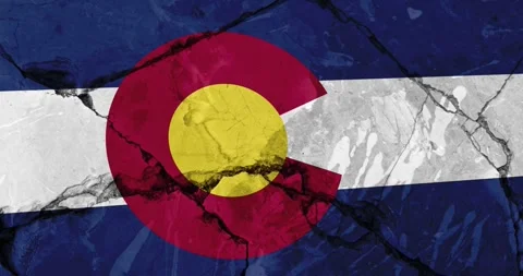 A cracked wall with The colorado state flag of the United States of America Video stock 337428059