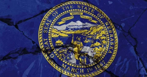 A cracked wall with The nebraska state flag of the United States of America Video stock 337429896