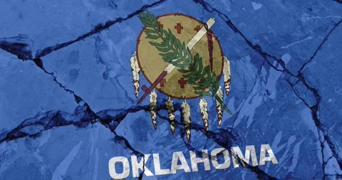 A cracked wall with The oklahoma state flag of the United States of America Video stock 337431120