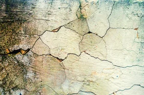Cracked wall, peeling plaster, Aged wall texture, background for design. Foto stock