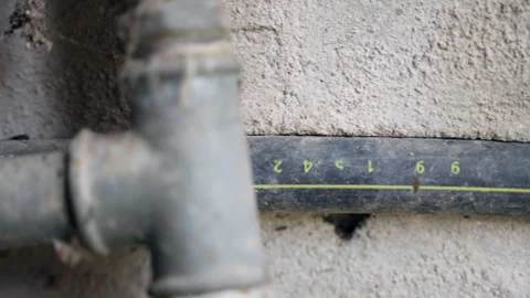 Cracked wall texture and broken tube inside, repairing pipeline system on Stock Footage 344647869