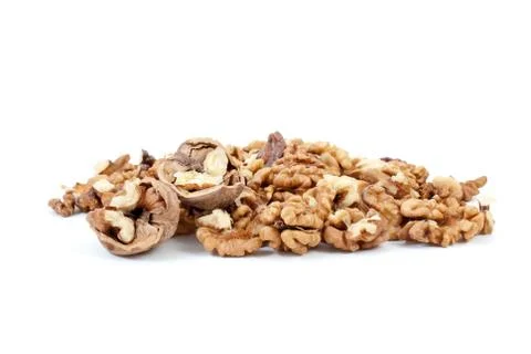 Cracked walnuts and kernels isolated on the white background Foto stock