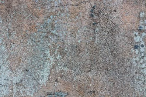 Cracked weathered multi colored background with different cement layers Stock Photos