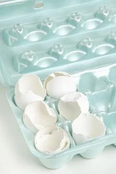 Cracked White Egg Shells On Styrofoam Tray Stock Photos