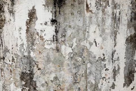 Cracked white ragged wall background texture Stock Photos