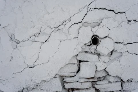 Cracked White Wall and Water Pipe Stock Photos