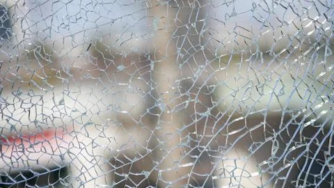 Cracked window broken glass background texture Stock Photos