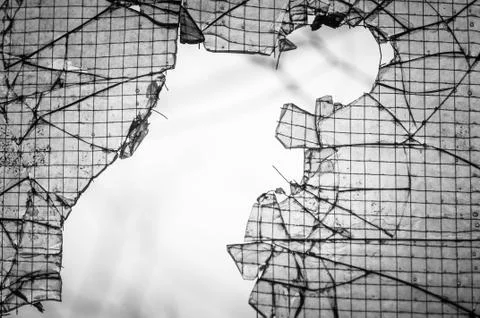 Cracked window with web Stock Photos