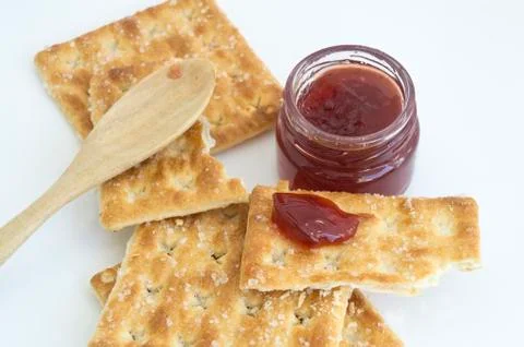 Cracker with bottle of jam Foto stock
