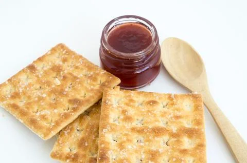 Cracker with bottle of jam Foto stock