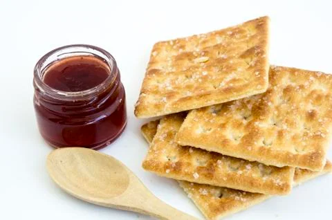 Cracker with bottle of jam Stock Photos