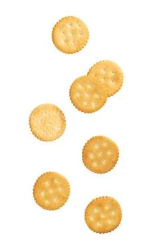 Cracker cookies falling isolated on white background with clipping path Stock Photos