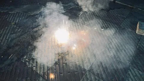 A cracker at night was captured at the time of blasting Stock Photos