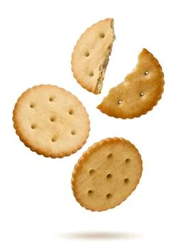 Crackers and halves flying on white background. Isolated Stock Photos