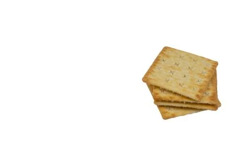 Crackers biscuits over white background. Selective focus Fotos Stock