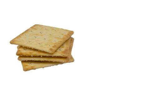Crackers biscuits over white background. Selective focus Stock Photos